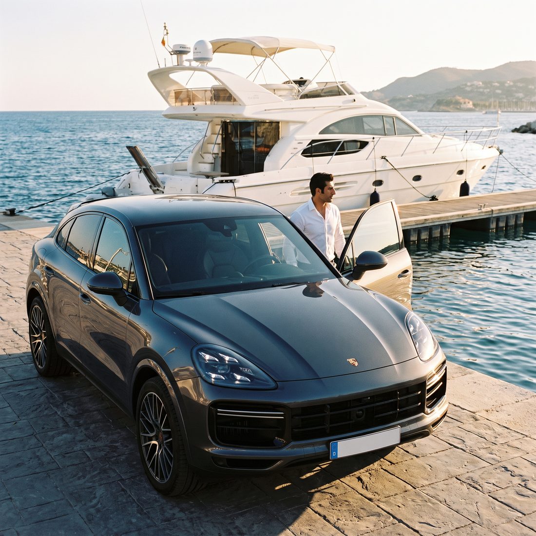 A car and a yacht at the marina — the workspace’s vehicles